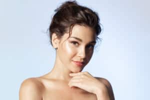 Woman with smooth skin after laser hair removal treatment.